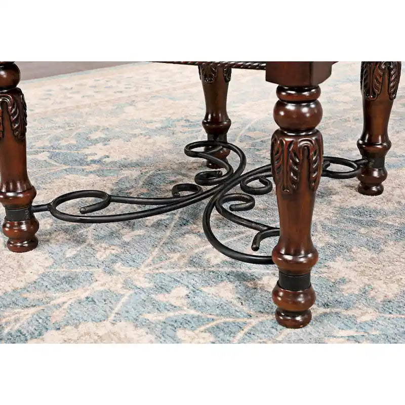 Set da pranzo allungabile in 7 pezzi, color ciliegio scuro, con sedie in similpelle nera, ospita fino a 8 persone